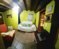 A bed or beds in a room at La Dueña I