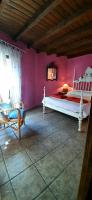 A bed or beds in a room at La Dueña I