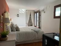 Posteľ alebo postele v izbe v ubytovaní Casa Boutique Eros