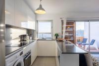 Kuchyň nebo kuchyňský kout v ubytování MEDANO4YOU Stellas Penthouse