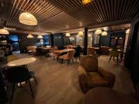 Posezení v ubytování Paris Saint Cloud Hôtel