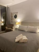 Posteľ alebo postele v izbe v ubytovaní Benal Beach Apartments