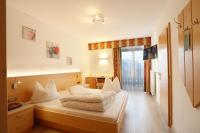 Posteľ alebo postele v izbe v ubytovaní Alpenhotel Ratsberg 1650m