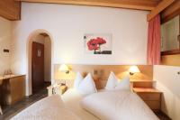 Posteľ alebo postele v izbe v ubytovaní Alpenhotel Ratsberg 1650m