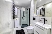 Kúpeľňa v ubytovaní Apartament Gwiazda Perła Krynicy