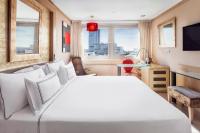 A bed or beds in a room at Melia Madrid Princesa