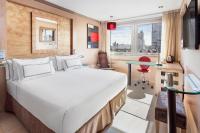 A television and/or entertainment centre at Melia Madrid Princesa