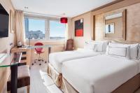 A bed or beds in a room at Melia Madrid Princesa