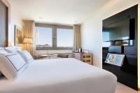 A bed or beds in a room at Melia Madrid Princesa