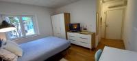 Posteľ alebo postele v izbe v ubytovaní Apartment Zsa Zsa Zenta 1