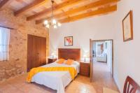 A bed or beds in a room at Finca Sitjoles