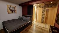 A bed or beds in a room at Bergblick - Mountainview