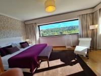 Uma cama ou camas num quarto em Quinta de Santo Estêvão Hotel Rural