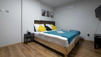 Postel nebo postele na pokoji v ubytování Apartamenty Sun & Snow Siedlisko Palenica