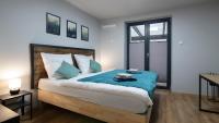 Postel nebo postele na pokoji v ubytování Apartamenty Sun & Snow Siedlisko Palenica