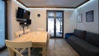 TV a/nebo společenská místnost v ubytování Apartamenty Sun & Snow Siedlisko Palenica