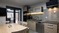 Kuchyň nebo kuchyňský kout v ubytování Apartamenty Sun & Snow Siedlisko Palenica