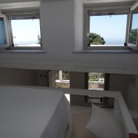 Posteľ alebo postele v izbe v ubytovaní Paros Apartments Cottage