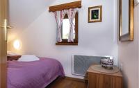 Posteľ alebo postele v izbe v ubytovaní One-Bedroom Holiday Home In Hrnjanec