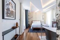 Le Dortoir Boutique Suitesにあるベッド