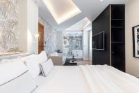 Le Dortoir Boutique Suitesにあるベッド