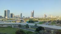 Nespecifikovaný výhled na destinaci Dubaj nebo výhled na město při pohledu z hotelu