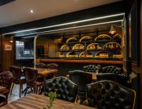 A seating area at Castle Old Town Hotel