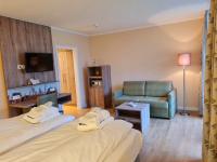 Postel nebo postele na pokoji v ubytování Hotel Landhaus Höpen