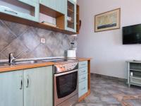 Kuchyňa alebo kuchynka v ubytovaní Apartment Starigrad-3 by Interhome