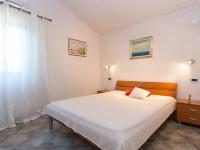 Posteľ alebo postele v izbe v ubytovaní Apartment Starigrad-3 by Interhome