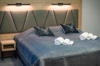 Posteľ alebo postele v izbe v ubytovaní Wójcik SPA - Krynica Zdrój