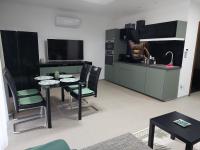 Kuchyňa alebo kuchynka v ubytovaní Sweet Home Apartman