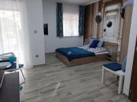 Posteľ alebo postele v izbe v ubytovaní Sweet Home Apartman