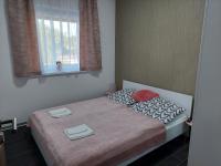 Posteľ alebo postele v izbe v ubytovaní Sweet Home Apartman
