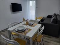 Posedenie v ubytovaní Sweet Home Apartman