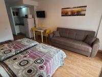 A bed or beds in a room at Beautiful Studio in Minerva