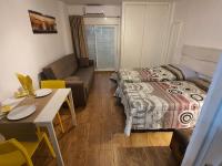 A bed or beds in a room at Beautiful Studio in Minerva