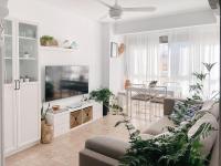 TV a/nebo společenská místnost v ubytování Apartament Ampolla Port