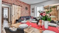 Posedenie v ubytovaní Apartament w Starym Tartaku 1 z Sauną - 5D Apartamenty