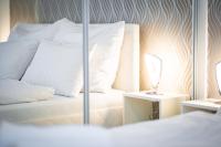Posteľ alebo postele v izbe v ubytovaní MyFlat Diamond Bay Apartment