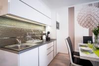 Kuchyňa alebo kuchynka v ubytovaní MyFlat Diamond Bay Apartment
