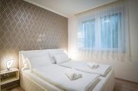 Posteľ alebo postele v izbe v ubytovaní MyFlat Diamond Bay Apartment