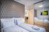 Posteľ alebo postele v izbe v ubytovaní MyFlat Diamond Bay Apartment
