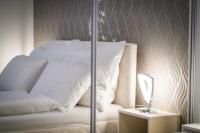 Posteľ alebo postele v izbe v ubytovaní MyFlat Diamond Bay Apartment