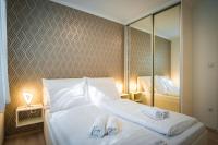 Posteľ alebo postele v izbe v ubytovaní MyFlat Diamond Bay Apartment