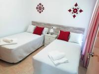 Posteľ alebo postele v izbe v ubytovaní CASA LILLA