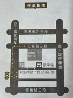 a sign for a southern motel with writing on it at Sonnien Hotel in Taipei