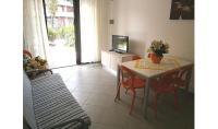 A television and/or entertainment centre at Condominio Quadrangolo-Gemini