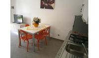 A seating area at Condominio Quadrangolo-Gemini