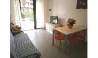 A television and/or entertainment centre at Condominio Quadrangolo-Gemini